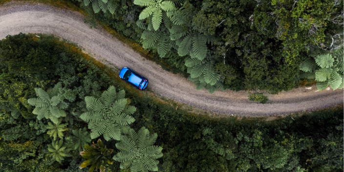 Car driving on a path